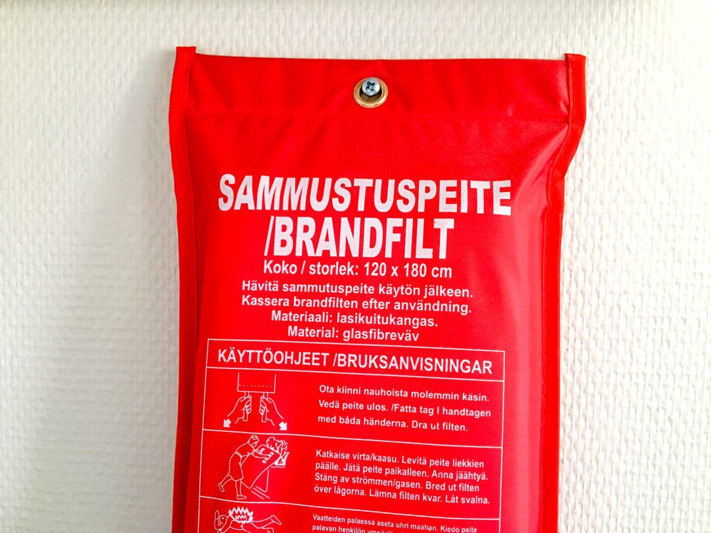 Sammutuspeite seinällä