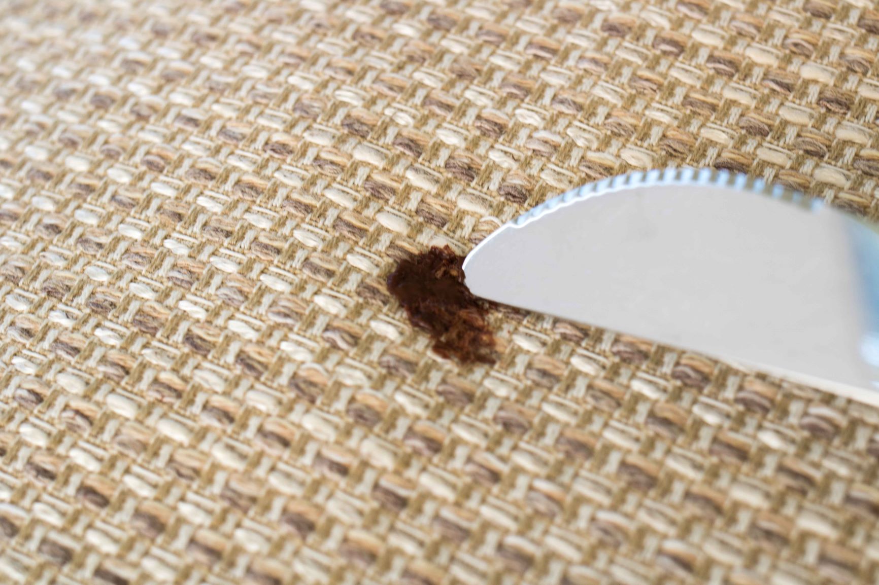 Tahran kaapiminen pois kankaasta