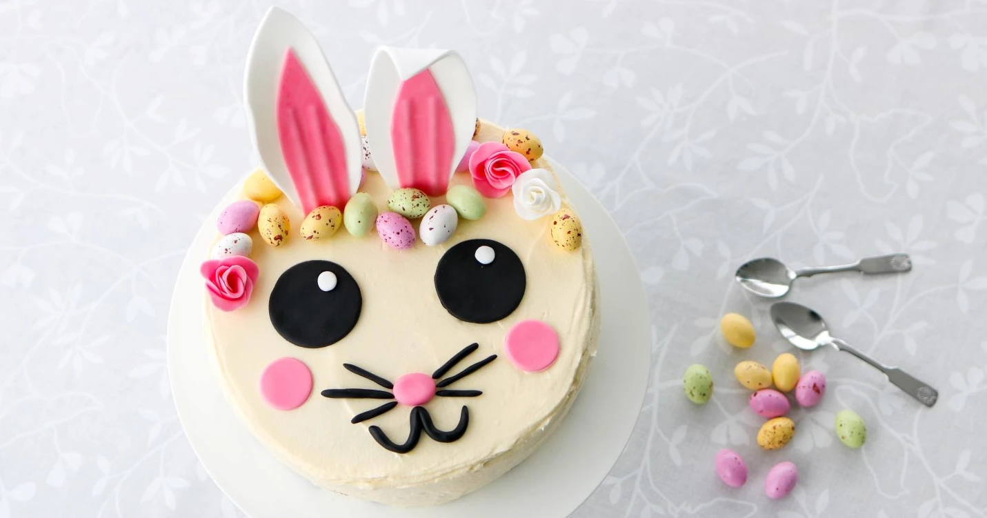 Pupukakku, jonka pinnalla on pupun kasvot.